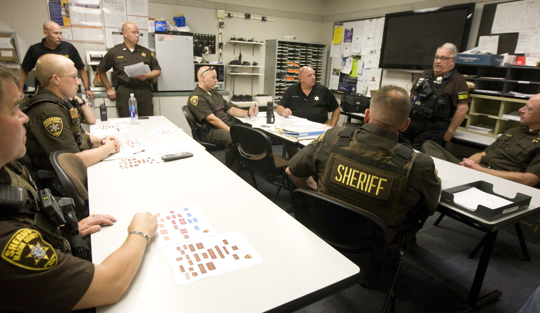 File: Buffett with deputies